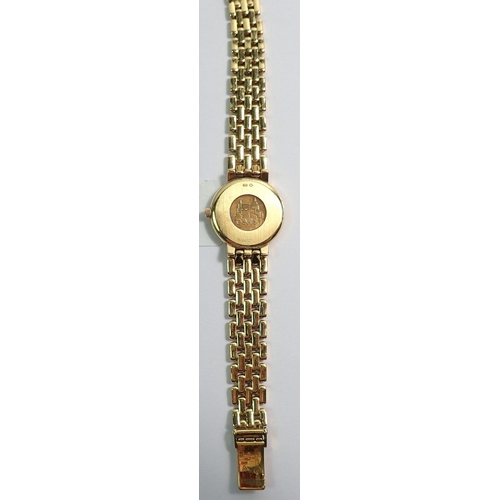 687 - An Omega ladies De Ville 18 carat gold wrist watch and strap, 42g total weight