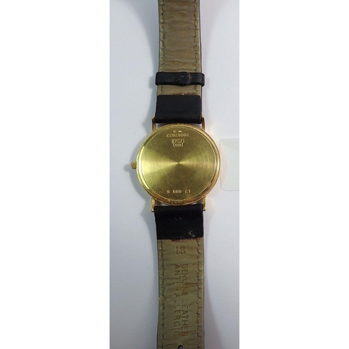 691 - An 18 carat gold Longines gentlemans quartz wrist watch with date niche