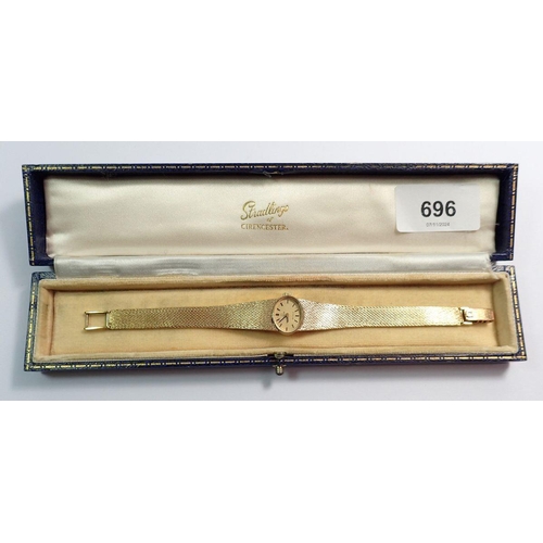 696 - A 9 carat gold Omega De Ville ladies wrist watch and strap, total weight 27g