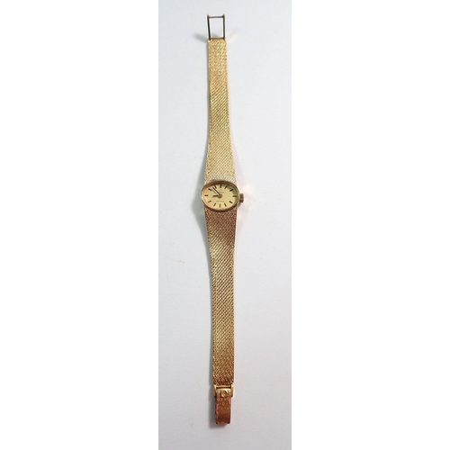 696 - A 9 carat gold Omega De Ville ladies wrist watch and strap, total weight 27g