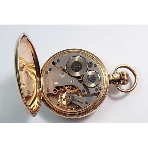 699 - An open faced Arabic dial Waltham USA 9 jewel keyless pocket watch in gold plated Dennison case