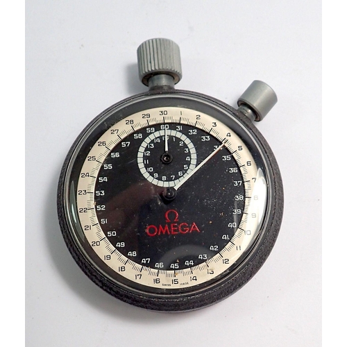 708 - An Omega stop watch in stainless steel case and original box