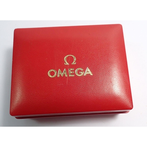 708 - An Omega stop watch in stainless steel case and original box