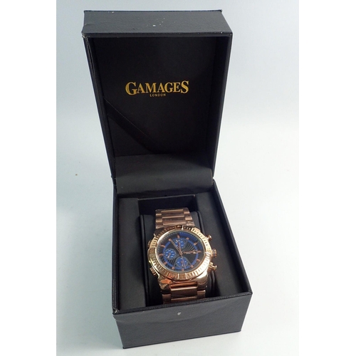 715 - A Gamages of London gentleman's wrist watch - boxed