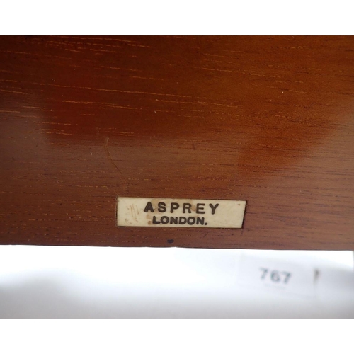 767 - An Asprey small reference library comprising of eight books including Dictionary, Atlas etc. all hou... 