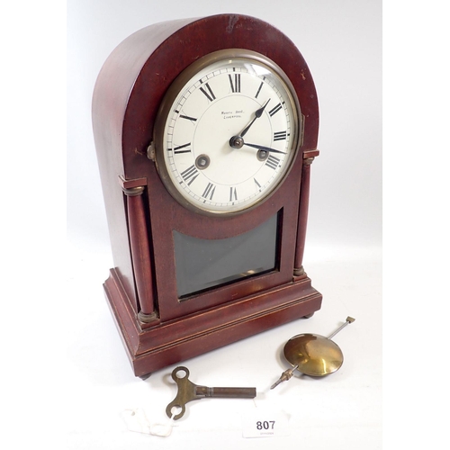 807 - An Edwardian mahogany mantel clock by Morath Bros Liverpool, 31cm tall