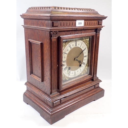 809 - A late Victorian oak bracket clock with brass face by Lenzkirch, 36cm high