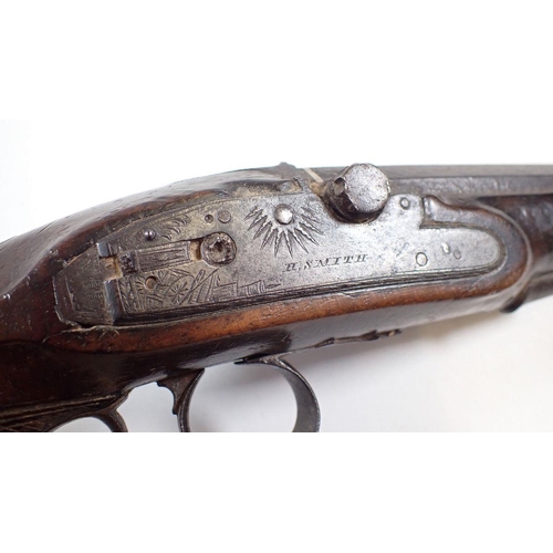 813 - An 18th century style flint lock pistol, the lock plate engraved H Smith, 23cm long