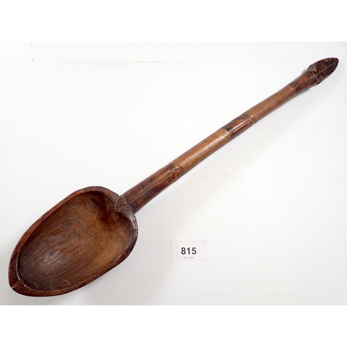 815 - A large tribal African carved wooden spoon, 48cm