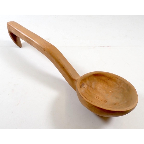 817 - A Welsh carved wood cawl spoon, 36cm