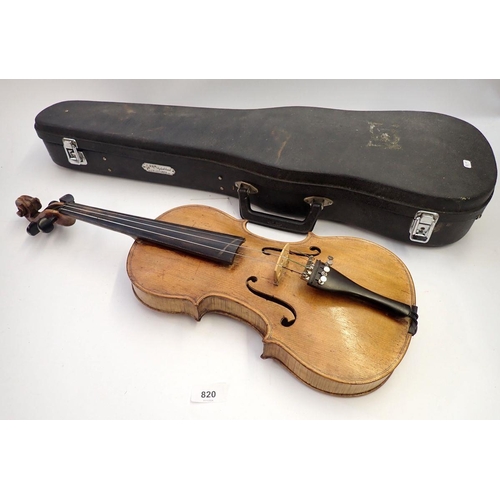 820 - A 19th century German violin in fitted case, 14 inch back, with label after Stradivarius