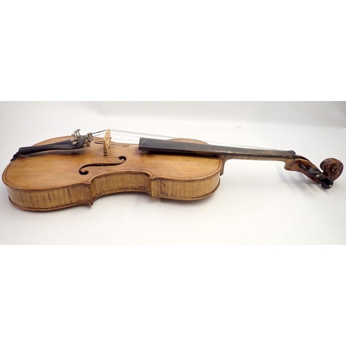 820 - A 19th century German violin in fitted case, 14 inch back, with label after Stradivarius