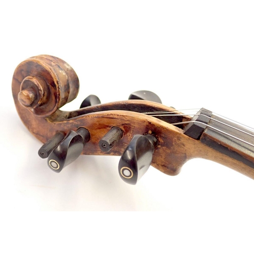 820 - A 19th century German violin in fitted case, 14 inch back, with label after Stradivarius