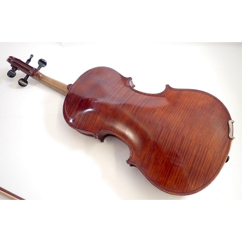 821 - A 19th century German violin and bow in fitted case, 14 3/8