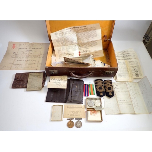 822 - A brown suitcase of Merchant Navy ephemera including Apprentice, Discharge, Competency and Service c... 