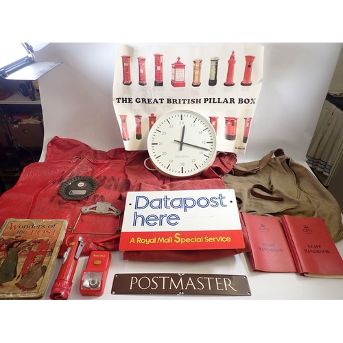 824 - A collection of GPO Post Office collectables and ephemera including wall clock, post sacks, bags, ha... 