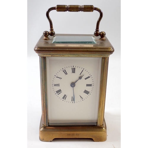 828 - A French brass cased 8 day carriage clock with platform lever escapement and Roman dial, 12cm tall