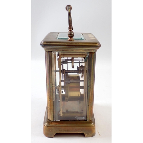 828 - A French brass cased 8 day carriage clock with platform lever escapement and Roman dial, 12cm tall