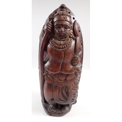 832 - A 19th century Tibetan carved wooden figure of Vaisravana, 28cm tall