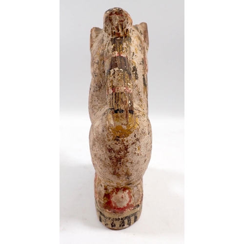 833 - A South American painted and carved wooden lion, 15.5cm tall