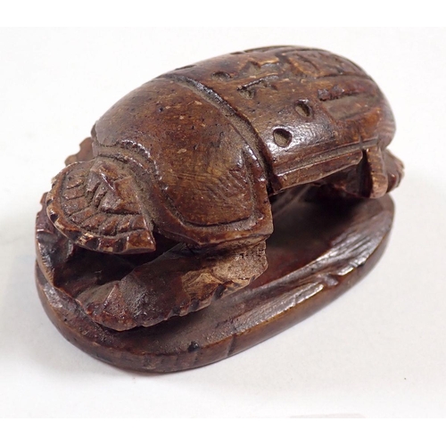 839 - A carved stone Egyptian scarab beetle, 5.5cm long