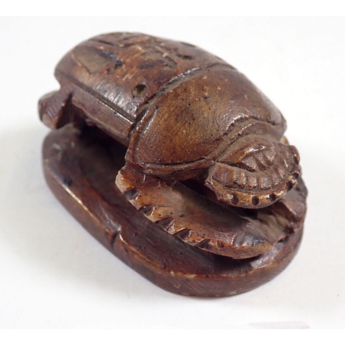 839 - A carved stone Egyptian scarab beetle, 5.5cm long