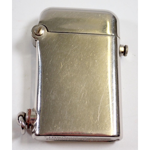 849 - A Thorens silver plated lighter and a silver plated vesta