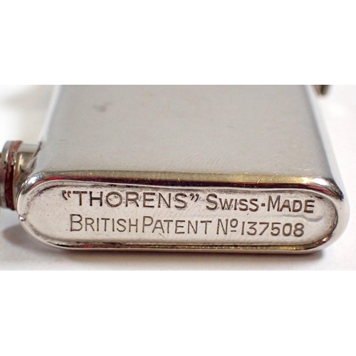 849 - A Thorens silver plated lighter and a silver plated vesta