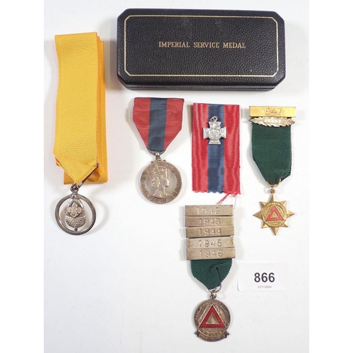 866 - A group of medals including Boy Scouts silver acorn, Elizabeth II Imperial service and two Safe Driv... 