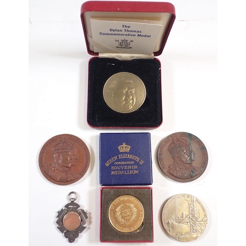 868 - A group of medallions including a 1924 British Empire Exhibition medallion, two Edward VII visit to ... 