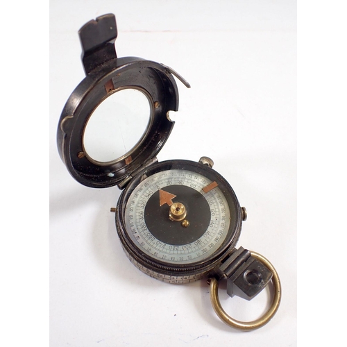 869 - A Sampson & Mordan WWI military compass with mother of pearl dial, 1918, in leather case with strap