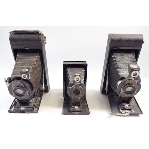 876 - A Hawk Eye folding camera and two Kodak Eastman cameras