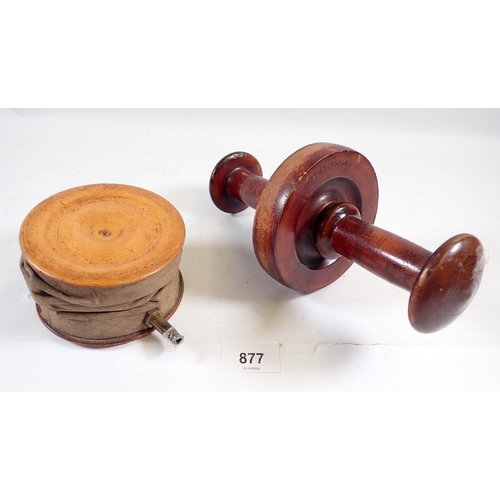 877 - An early 20th century turned wood exercise wheel, 22cm wide and a small bellows