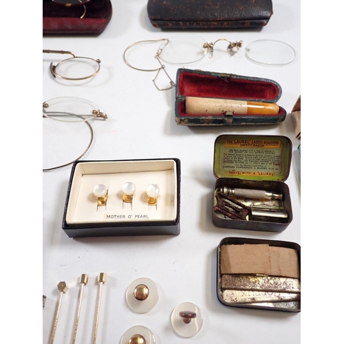 906 - Various collectables including four pairs of yellow metal spectacles, razors, cheroot holder, studs,... 