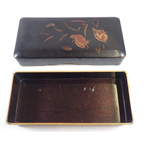 911 - A black lacquer glove box painted birds, 28 x 13 x 5.5cm