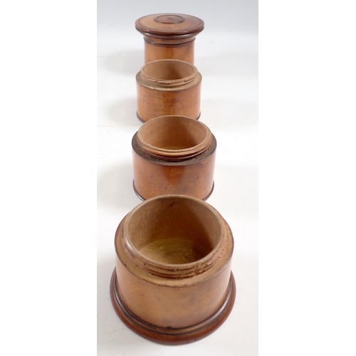 959 - A Victorian turned treen spice box with four ciruclar sections, 19.5cm tall