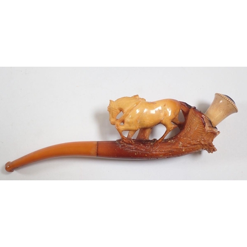 964 - A large amber and meerschaum pipe with carved lady and horse - cased