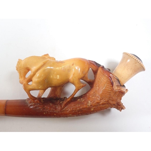 964 - A large amber and meerschaum pipe with carved lady and horse - cased