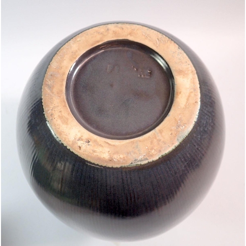 97 - A black ribbed large studio pottery vase, impressed marked Barlane, 34cm