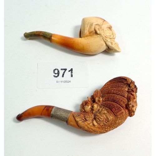 971 - Two amber and meerschaum cheroot holders, one in the form of conch shell with white metal mount, one... 