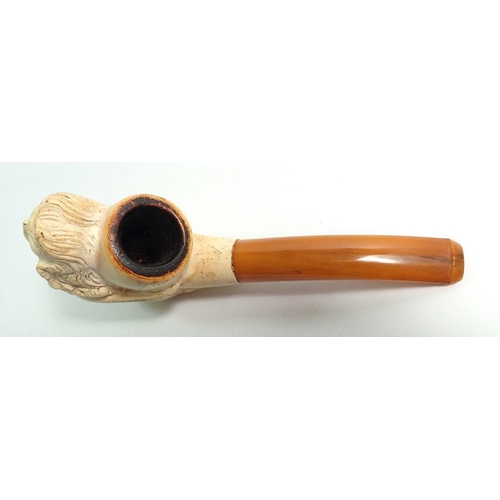 974 - An amber and meerschaum pipe with carved ships maiden masthead - uncased with associated leaflet