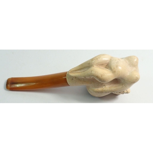 974 - An amber and meerschaum pipe with carved ships maiden masthead - uncased with associated leaflet