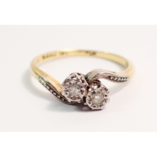 405 - An Edwardian 18 carat gold ring crossover set two illusion set diamonds, size K, 2.4g