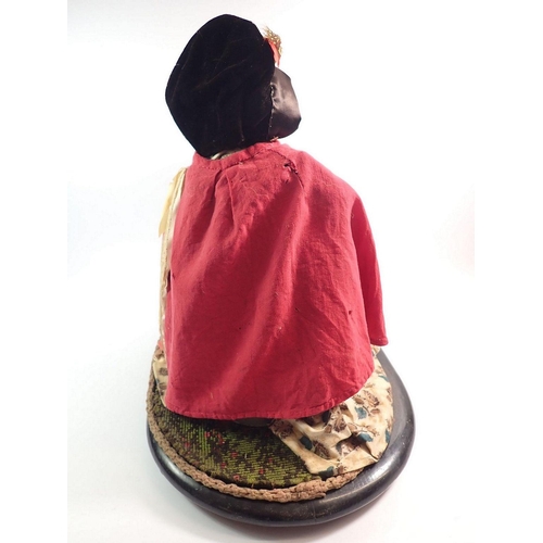 1082 - A large Victorian wax headed peddler doll with tray of wares, under glass dome, approx 48cm