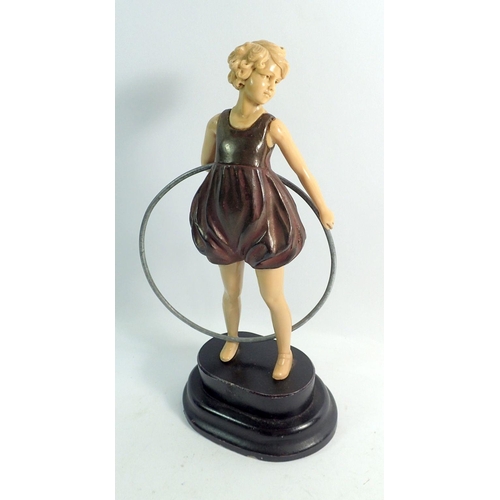 1085 - A 1920's reproduction figure in the style of Ferdinand Preiss of a girl with a hoop, 22cm tall