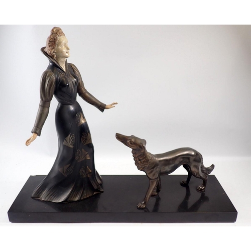 1086 - Salvatore Melani - Art Deco bronze finish group with elegant lady and greyhound on a marble base, 55... 