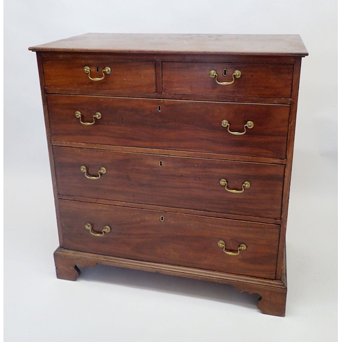 1104 - A Georgian style mahogany chest of two short and three long drawers on bracket supports, 100 x 53 x ... 