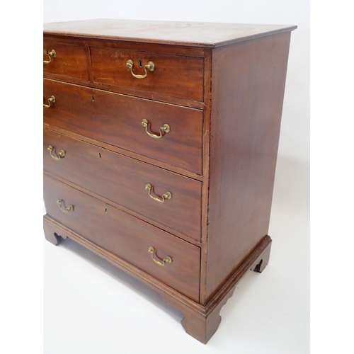 1104 - A Georgian style mahogany chest of two short and three long drawers on bracket supports, 100 x 53 x ... 