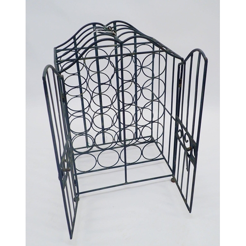 1138 - A wrought iron dome top wine rack to hold forty bottles