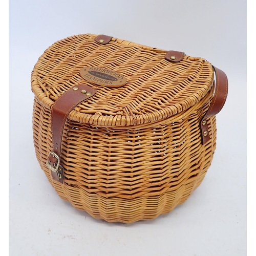 1149 - A wicker basket with shoulder strap by Sherwood Hampers, 29cm tall